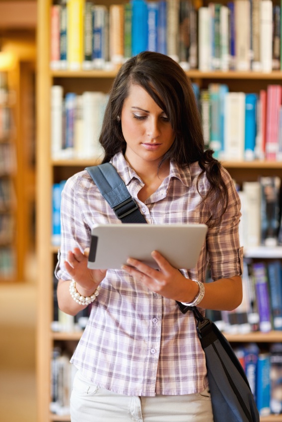 girl using tablet for content