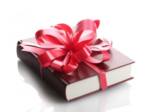 book with a bow-holiday gift books