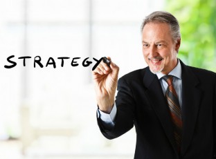 businessman writing strategy