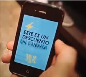 hand holding smartphone-spanish phrase on screen