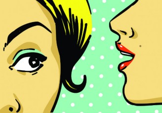 woman whispering in woman's ear