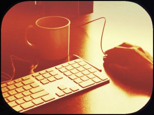 keyboard-coffee cup-hand on mouse