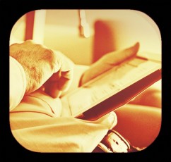 hands holding tablet