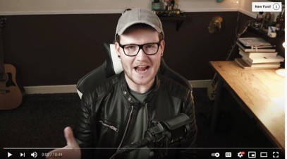 An image showing a video with a card in the top right corner that suggests other videos to watch such as “New Font”.