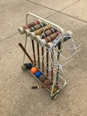 An image showing a vintage croquet set.