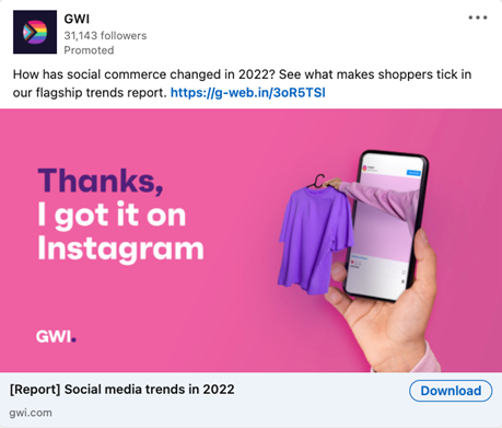 GWI ad with an arm holding a purple shirt on a hanger coming out of a smartphone with the copy “Thanks, I got it on Instagram,” includes a simple question before the CTA: “How has social commerce changed in 2022? See what makes shoppers tick in our flagship trends report.”